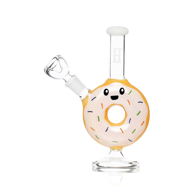 Vue de face du bang HEMPER Donut jaune avec glaçage blanc, vermicelles colorés et visage souriant
