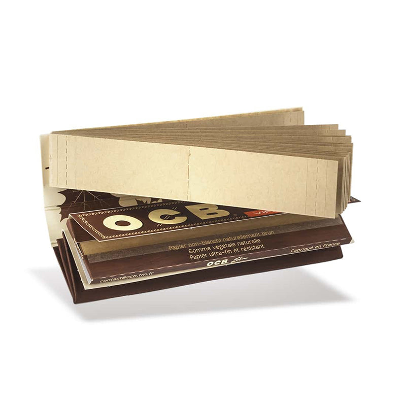 Paquet OCB Slim Roll Kit Virgin déplié en plateau à rouler, avec les feuilles et les cartons intégrés