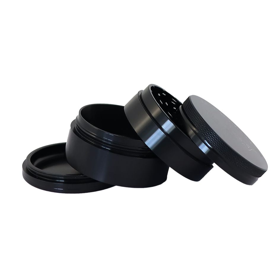 Grinder RAW x Hammercraft noir démonté en 4 parties, vue des différents compartiments en aluminium – Holy Mary