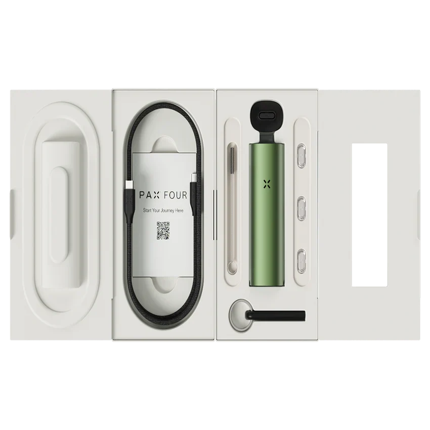 Vaporisateur PAX Four Greenstone – Coffret ouvert avec appareil, accessoires et câble de charge – Holy Mary